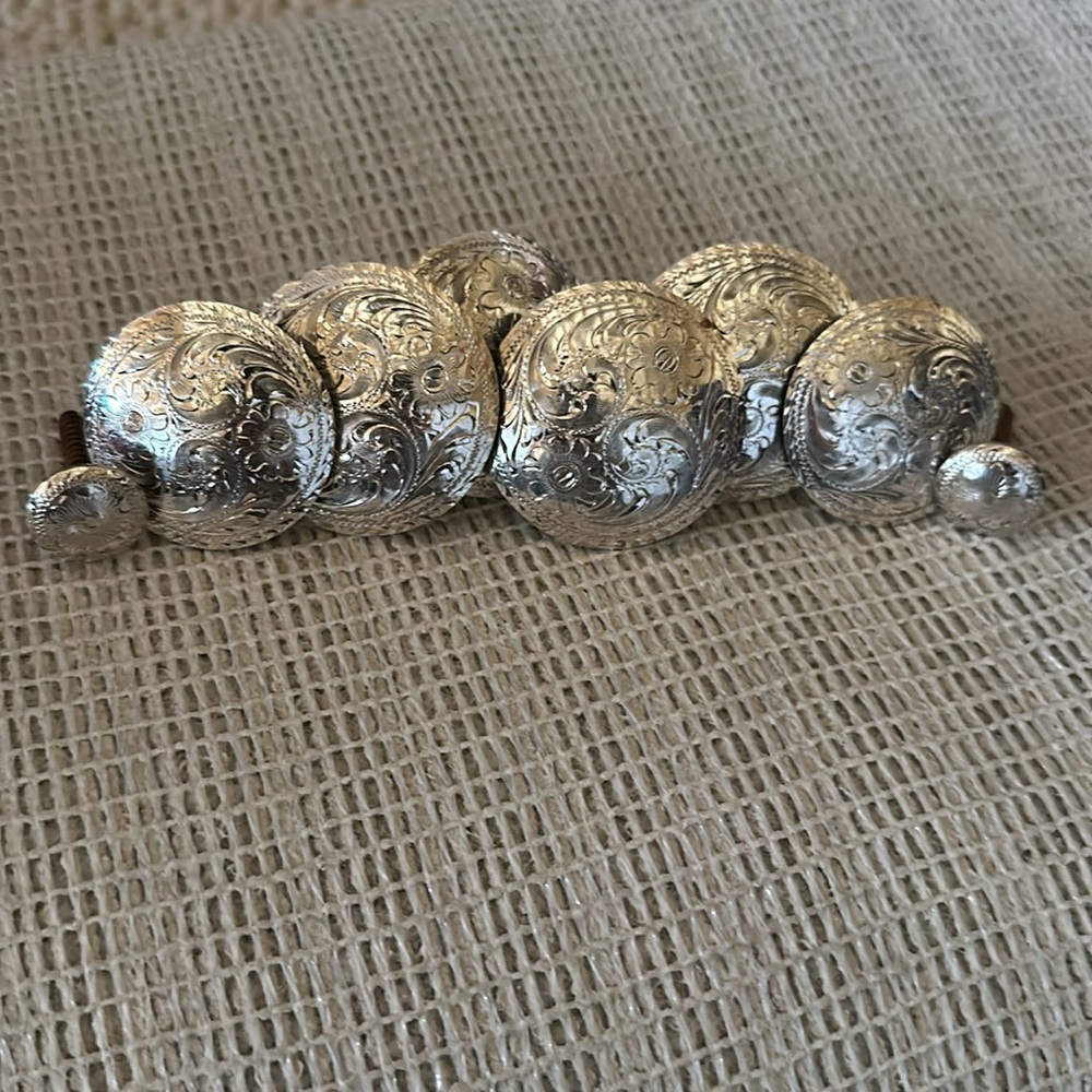 Custom Sterling Overlay Woodscrew set, made by Brroken Horn Saddles in CA.